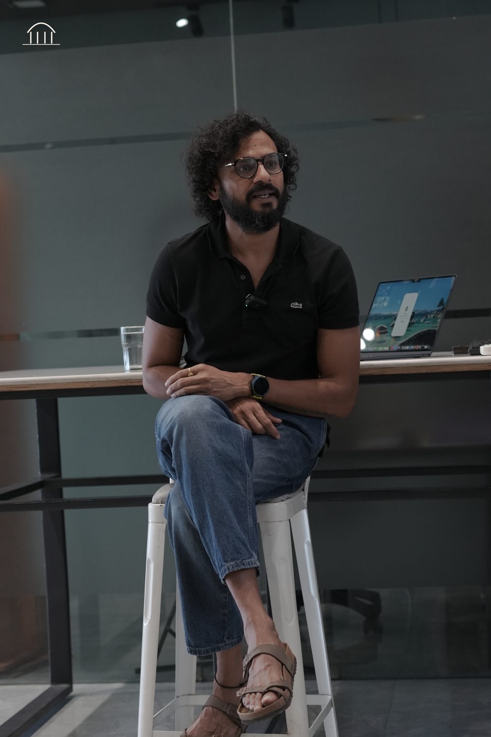 Rajat Asawa seated, speaking